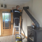 Chimney Sweep Cleaning Stove Flue
